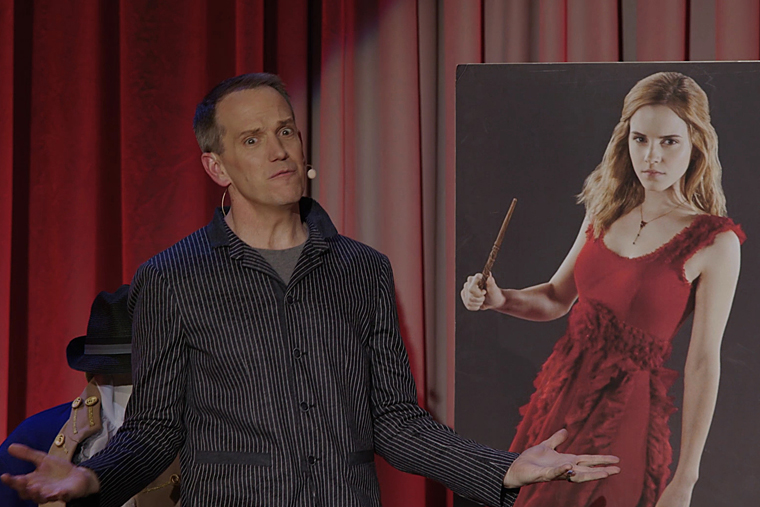 Rob Skinner serenading a photo of Emma Watson